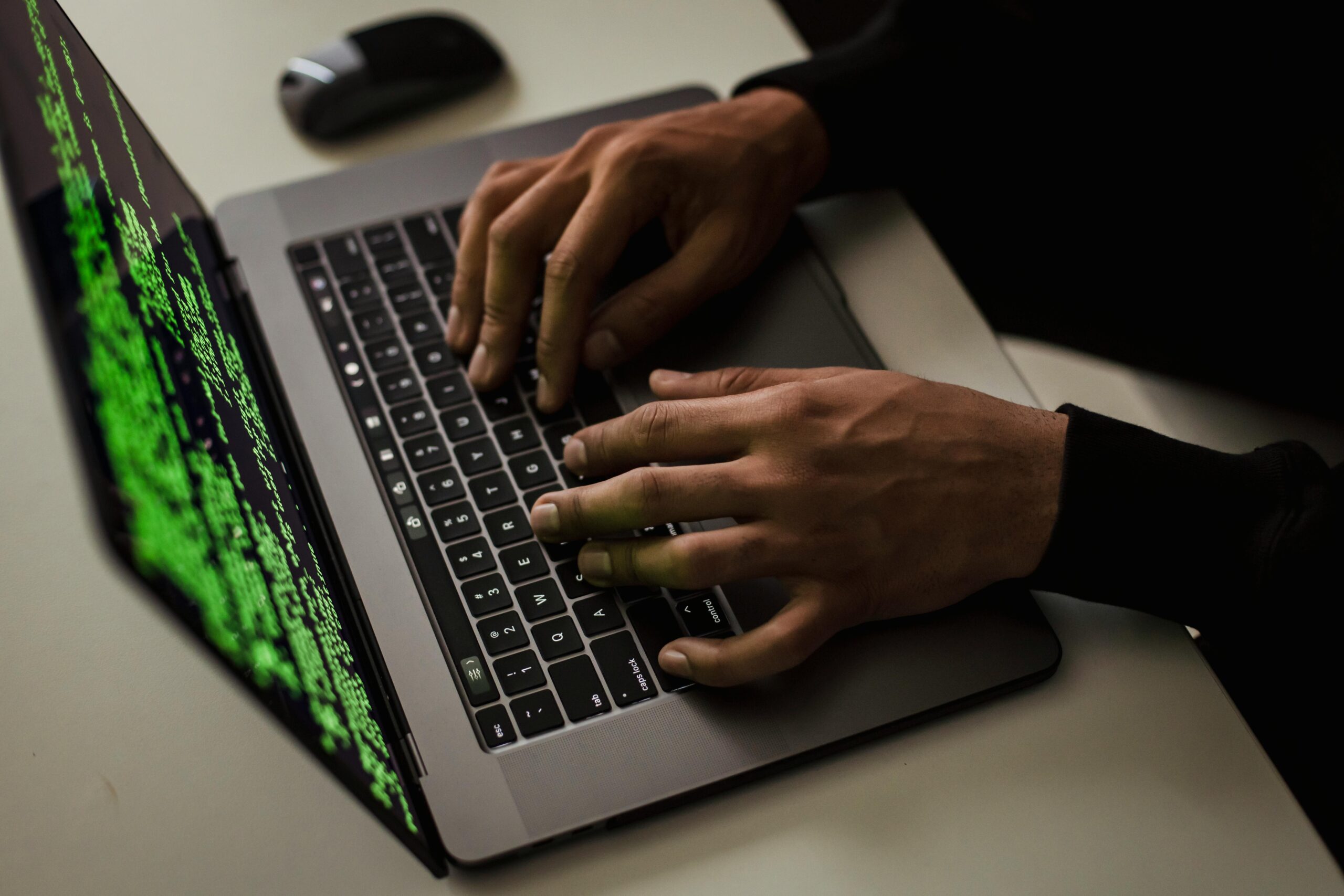 7-Unexpected-Ways-Hackers-Can-Access-Your-Accounts-scaledjpg crop-cyber-spy-hacking-system-while-typing-on-laptop
